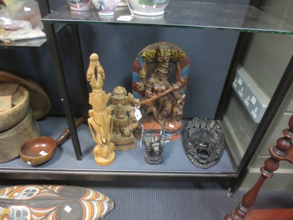 A quantity of various 20th century tribal carved wood figures and other items