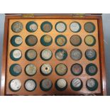 A late Victorian coin collection mahogany tray cabinet containing sundry coins