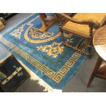 A blue ground patterned Chinese wool rug, approx 370 x 280cm