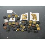 A collection of military and general service buttons