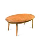 An Ercol blonde ash coffee table, the oval top on four splayed legs 51 x 121 x 76cm (20 x 47 x 30in)