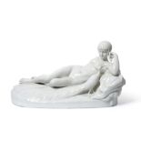 A large continental Art Deco white porcelain group of Juno and the Peacock, reclined and holding
