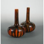 A pair of Burmantofts bottle vases, possibly designed by Dr Christopher Dresser, each with incised