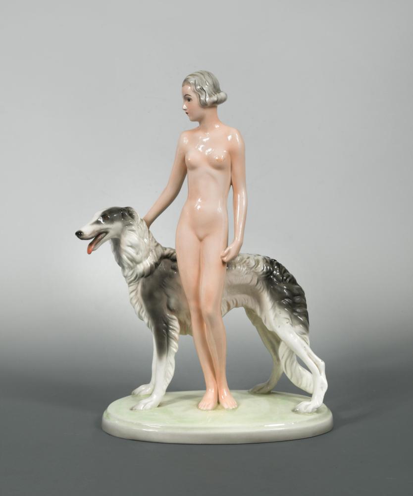 A Joesef Schuster model of a female nude with a Borzoi, probably designed by Josef Lorenzl,