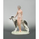 A Joesef Schuster model of a female nude with a Borzoi, probably designed by Josef Lorenzl,