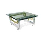 A contemporary glass topped aluminium coffee table, the brushed and brass plated aluminium frame