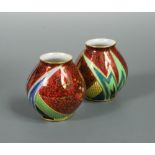 A rare pair of Carlton ware 'Jazz' pattern vases, pattern no. 3352, printed and painted in colours