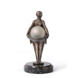 § Max Le Verrier (French, 1892-1973), an Art Deco silvered metal figural table lamp, circa 1925,