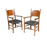 William Birch, a set of six oak dining chairs, comprising four singles and a pair of carvers with