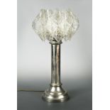 A reproduction silver plated pillar lamp, with 1970s mottled plastic shaped shade 87cm (34in)