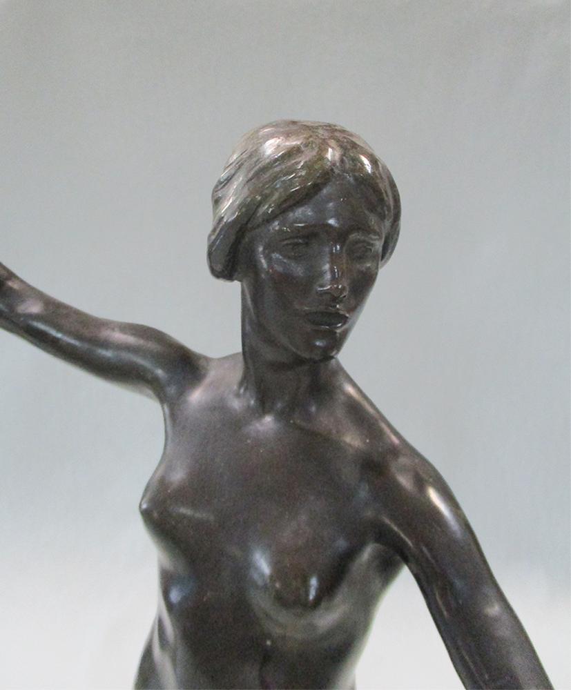 An early 20th century bronze model of a cymbal playing female nude, modelled standing on tip toes, - Image 2 of 3
