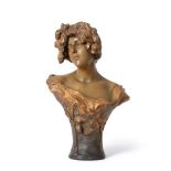 Cherc for Goldscheider, an Art Nouveau cold painted terracotta bust of a maiden, with a garland of