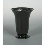 A Gray-Stan amethyst glass vase, of flared cylindrical form to a spreading circular foot, etched
