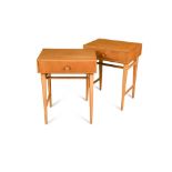A pair of mid-20th century oak veneer lamp tables, each with rectangular top over frieze drawer on