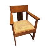 An early 20th century Hague School oak and coromandel elbow chair, with over-stuffed drop-in seat