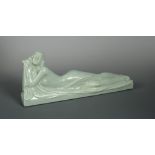Marines-France, an Art Deco pastel green glazed pottery figure of a recumbent female nude