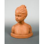 A Goldscheider terracotta bust of a young female nude, impressed marks and numbered to reverse