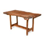 Reynolds of Ludlow, a yew wood coffee table, the rough sawn plank top on four octagonal supports