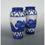 A pair of early Moorcroft Dawn Landscape pattern vases, painted between chevron borders, painted and