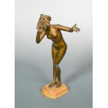 Paul Philippe, (French, 1870-1930), 'Masquerade', a bronze study, modelled as a female nude removing