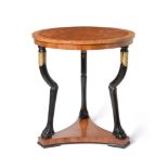 A pair of Biedermeier style yewwood and kingwood veneered and crossbanded tripod centre tables,