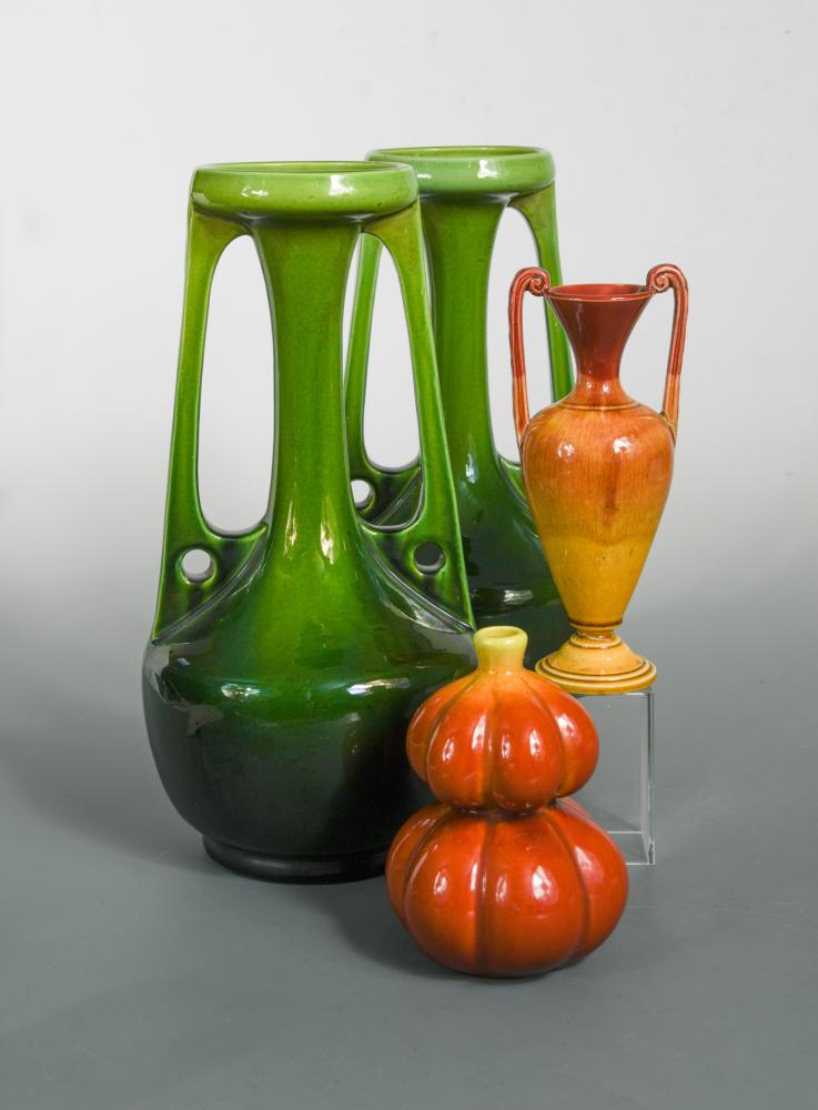 A large pair of Bretby Art Pottery twin-handled vases, with lustrous green glaze, impressed marks,