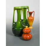 A large pair of Bretby Art Pottery twin-handled vases, with lustrous green glaze, impressed marks,