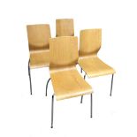 A set of eight oak laminate bent plywood stacking chairs, on tubular chromed supports 90cm (35in)