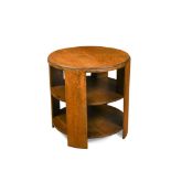 An Art Deco oak book table in the manner of Heals, of three-tier circular form raised on concave