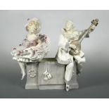 A Schauer, Vienna faience Pierrot and Pierrette figure group by Hoffmann, the figures modelled