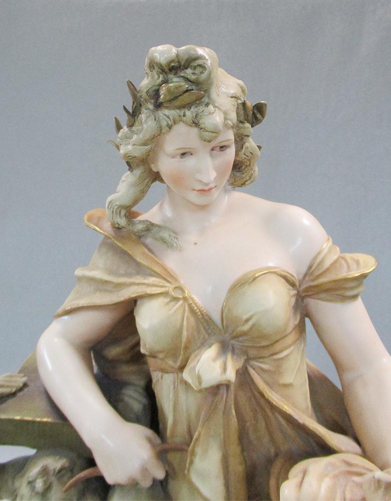 Ernst Wahliss (Austrian 1837-1900), an Art Nouveau pottery figure of a pretty young woman, - Image 2 of 6