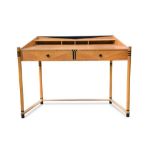 Masterly, Italy, a contemporary birds eye maple writing desk and two chairs, the desk with three