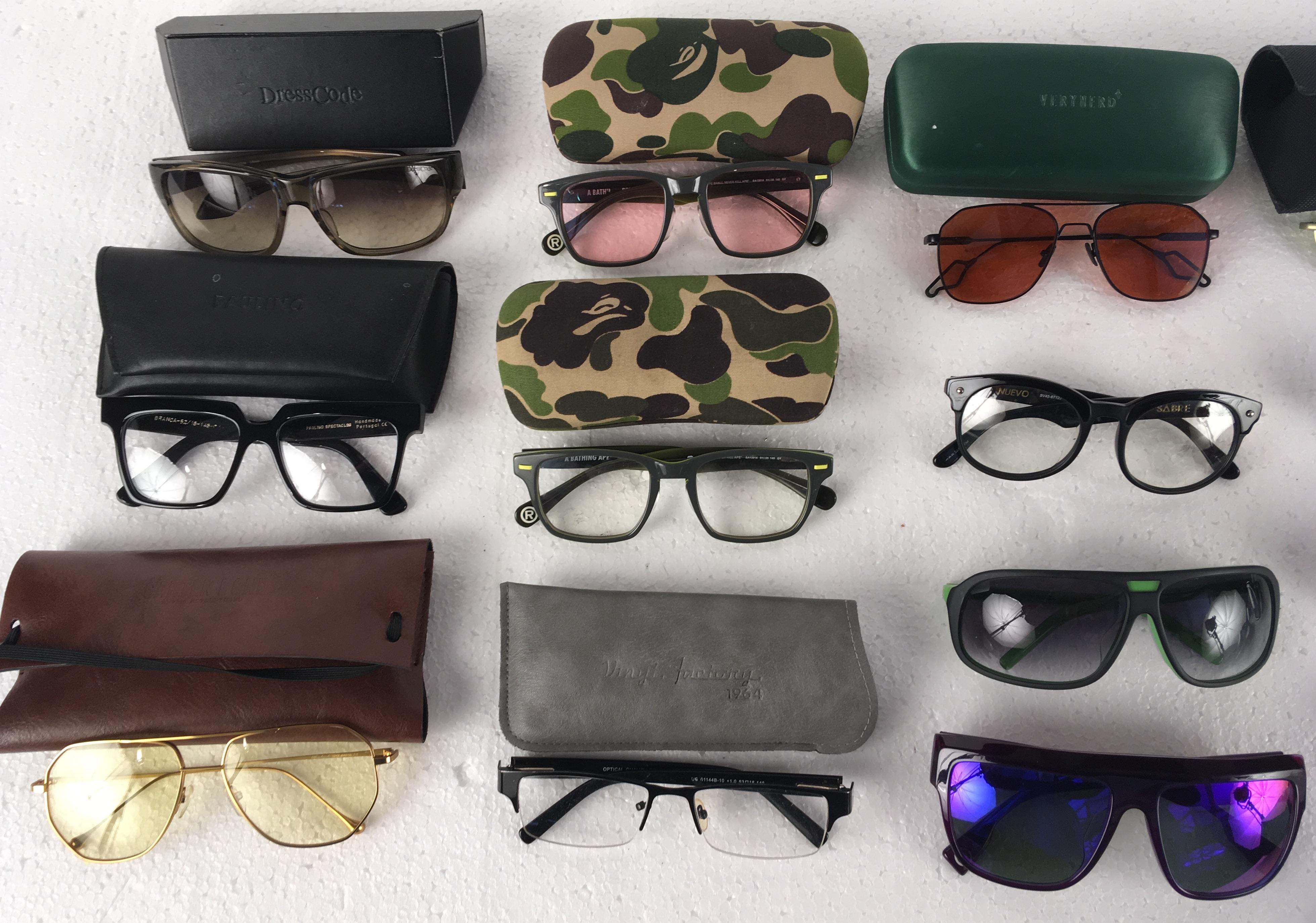 A collection of mostly designer sunglasses, to include; Alexander McQueen, Prada, A Bathing Ape, - Image 2 of 10