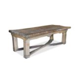 Nield, a rustic oak refectory table with a single plank top, with a pair of matching benches, one