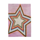 Paul Smith for the Rug Company, a star design carpet, with central multi coloured star motif on pink