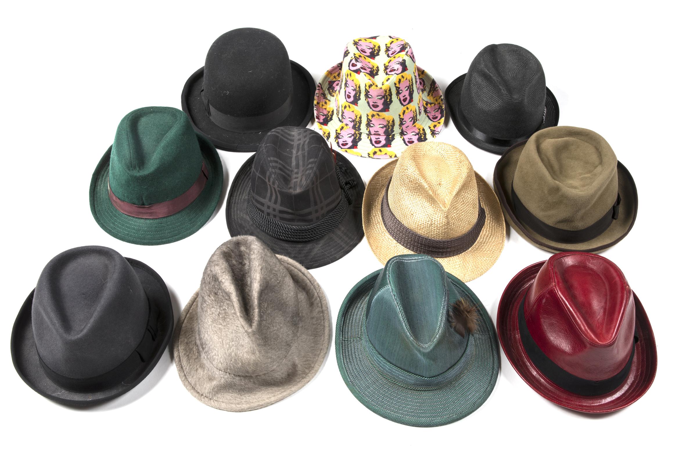 A collection of eleven mostly trilby type hats, many by CA4LA including an Andy Warhol Marilyn print