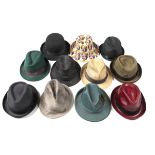 A collection of eleven mostly trilby type hats, many by CA4LA including an Andy Warhol Marilyn print