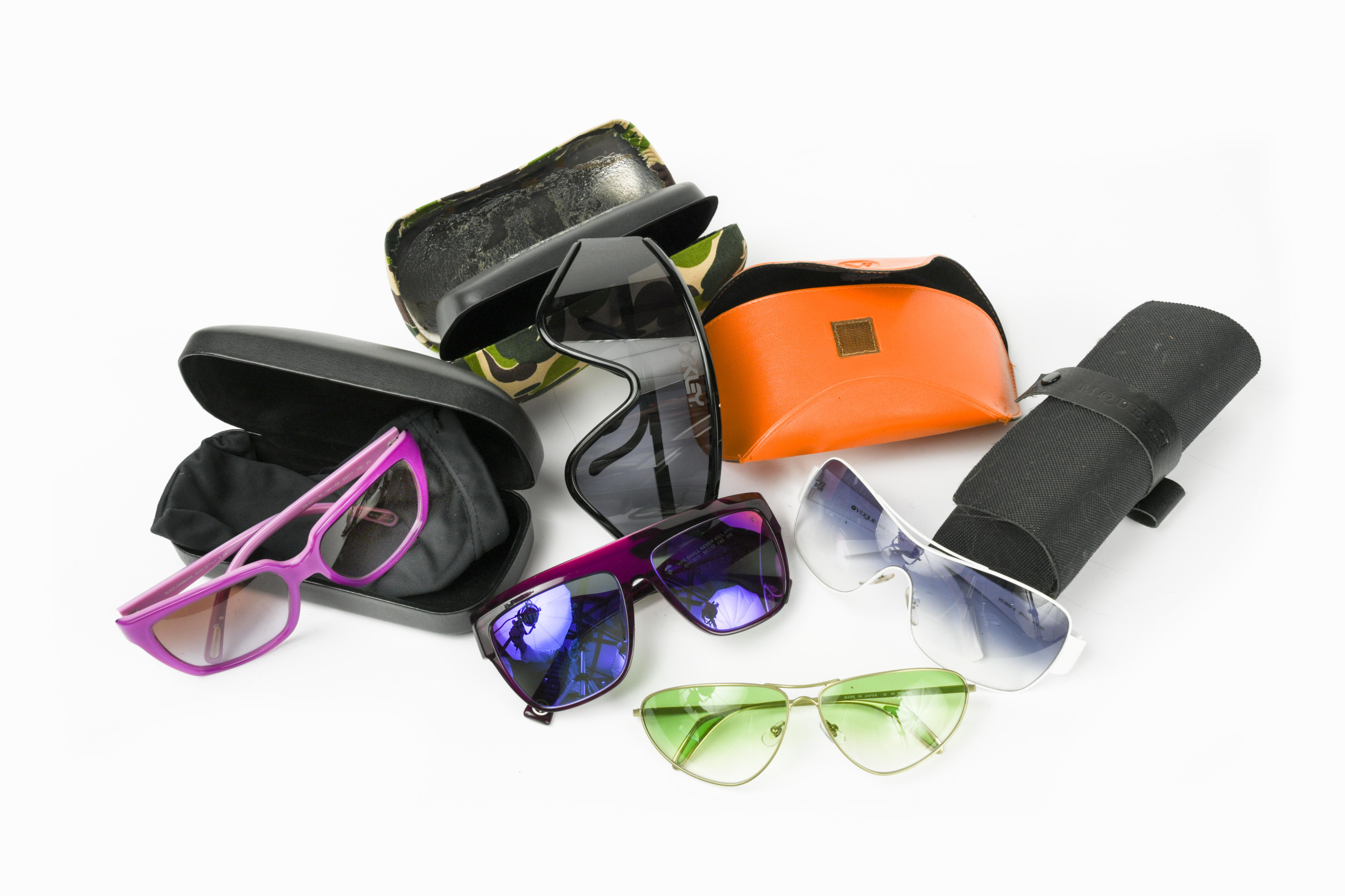 A collection of mostly designer sunglasses, to include; Alexander McQueen, Prada, A Bathing Ape,