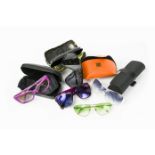 A collection of mostly designer sunglasses, to include; Alexander McQueen, Prada, A Bathing Ape,