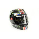 Bell, a customised crash helmet, bearing Team Traction Control members' names, dedicated to the