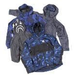 A Bathing Ape (BAPE) six hooded rain jackets, some in blues, greys and black camouflage, sizes