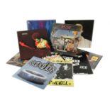 A collection of vinyl LP's and 45's, to include; albums by Led Zeppelin, Nirvana, The Sex Pistols,