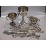 A silver presentation engraved trowel, two silver trophies, together with a silver sugar bowl,