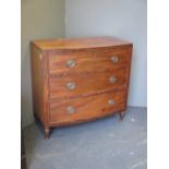 A Regency mahogany bow front chest of drawers on turned legs 86 x 91 x 48cm