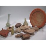 Seven various Roman pottery oil lamps, a cuniform tablet and other items of antiquity (a parcel)