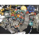 A collection of ethnic jewellery, some continental silver