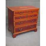 A George III mahogany and crossbanded chest of four long graduating drawers on bracket feet 79 x