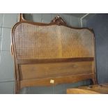 A continental caned bed