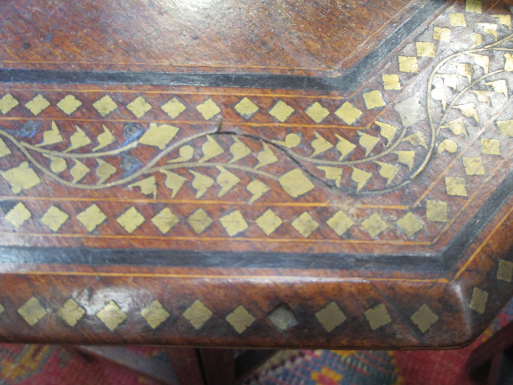 Three early 20th century Indian brass inlaid octagonal occasional tables on folding stands, - Image 3 of 4