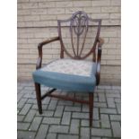 A Hepplewhite mahogany open armchair, 103cm high x 61cm wide